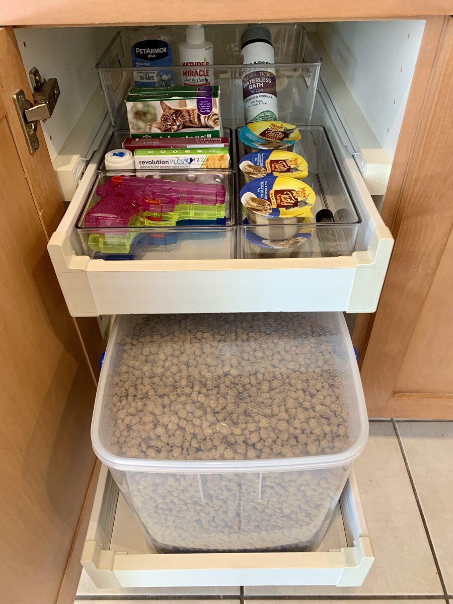 Pet supply organization station with labeled bins and daily feeding access — Simply Spacial Sarasota
