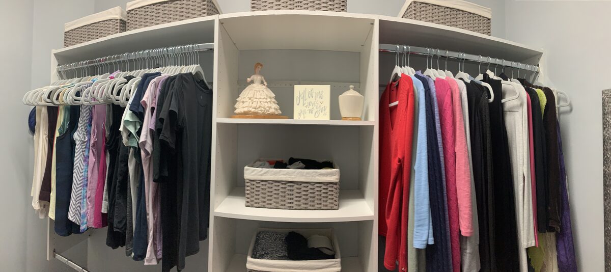 Walk-in closet organized by type, color, and season — Simply Spacial Sarasota FL