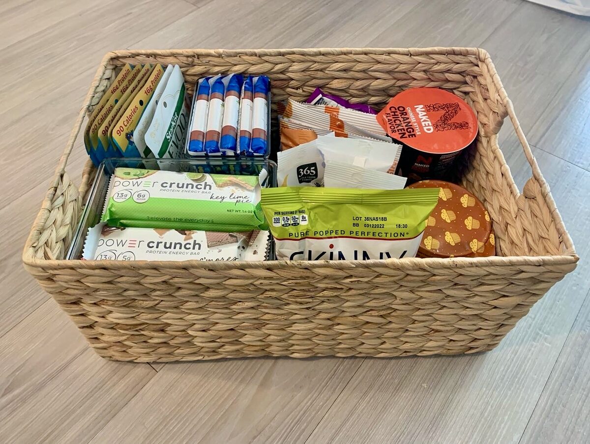 Snack basket with clear containers and visual access for ADHD-friendly organization — Simply Spacial Sarasota